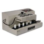 Masina cu banda pentru sigilare prin inductie